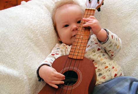 Picture - baby playing guitar